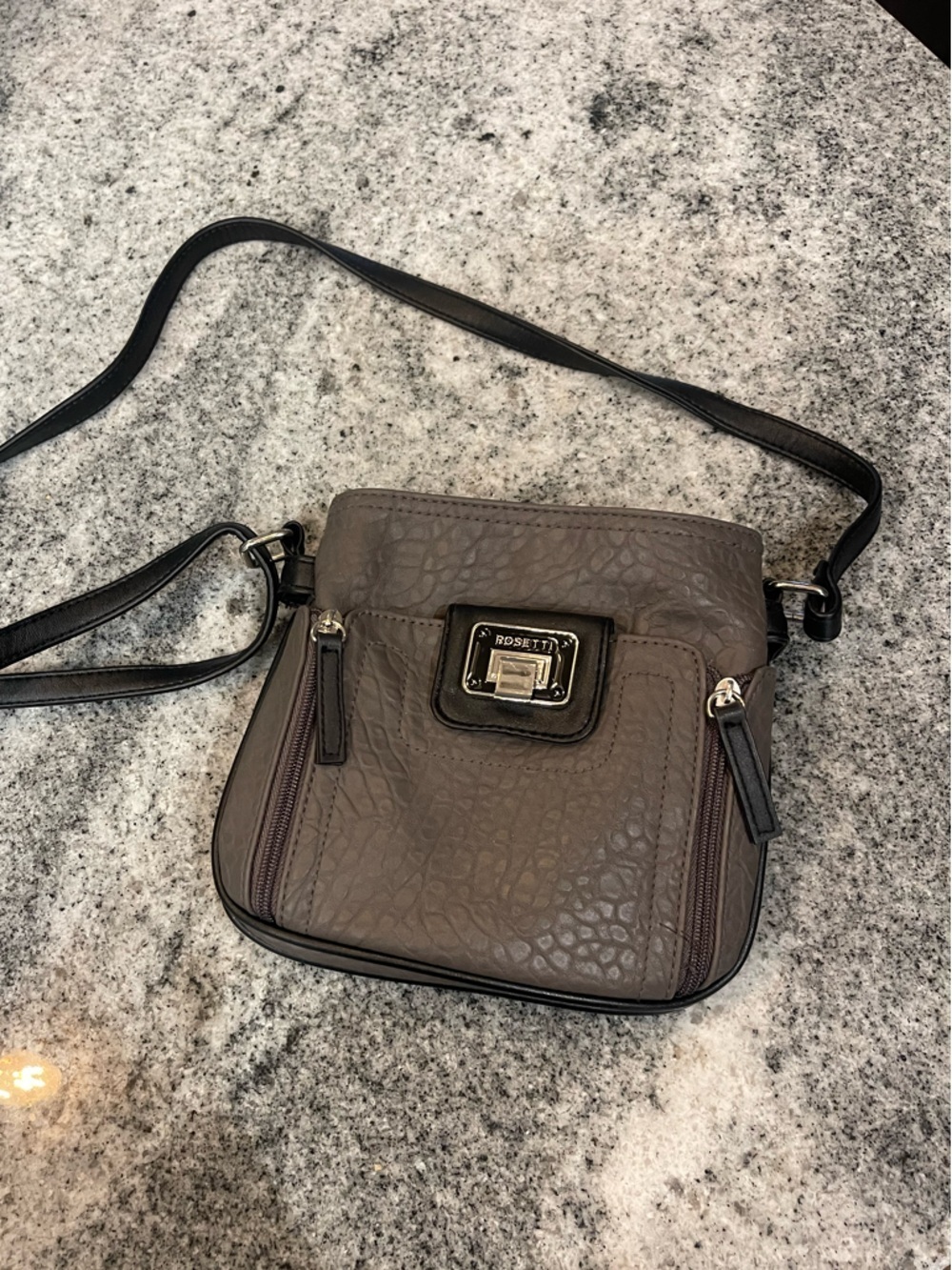 Rosetti Taupe Pebbled Crossbody with Black Trim and Silver Hardware